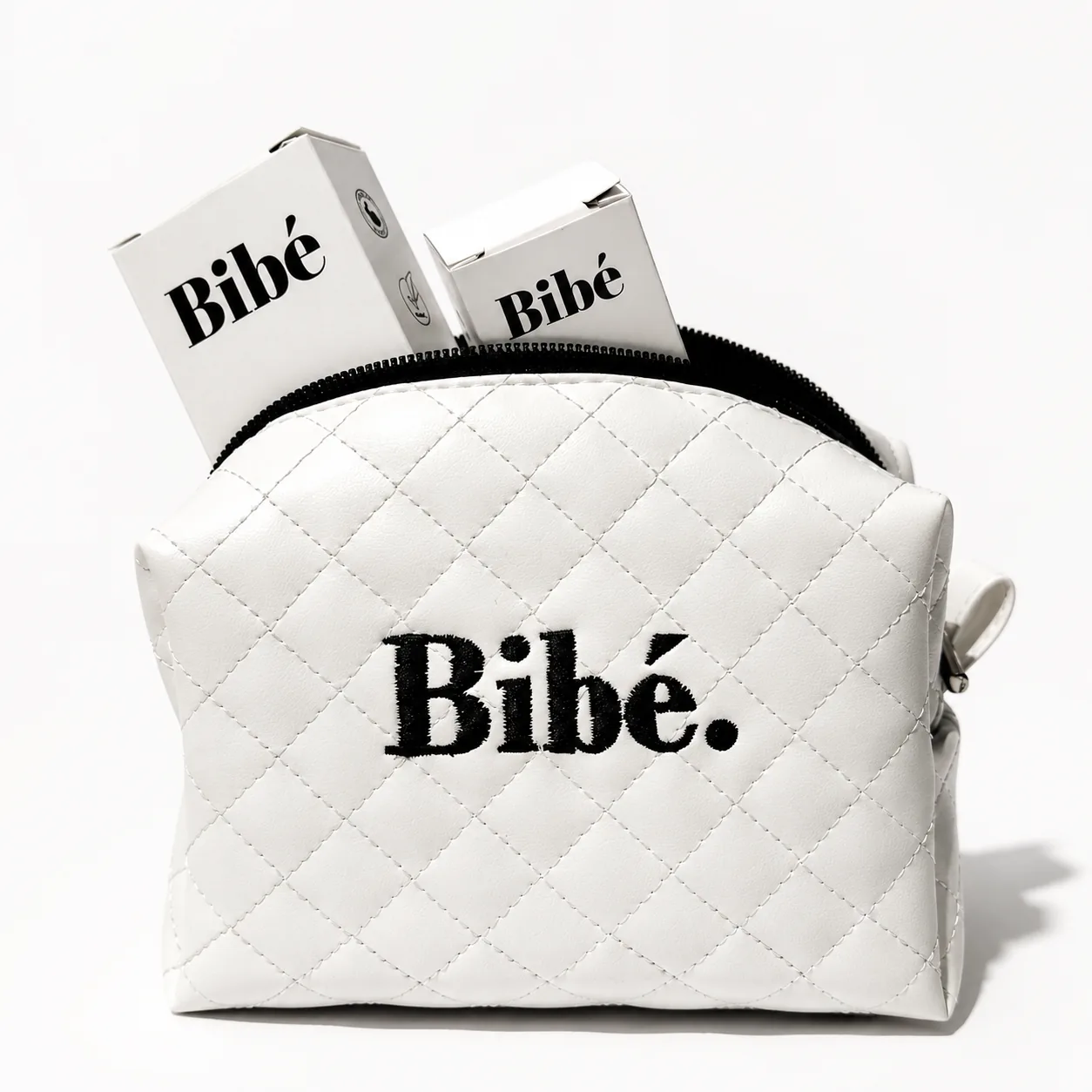 Bibé quilted pouch with packaging boxes
