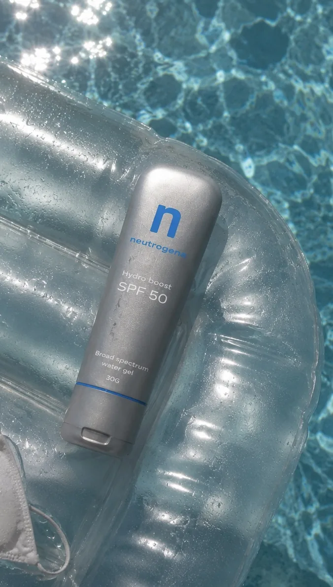 Reimagined SPF tube resting on a pool float