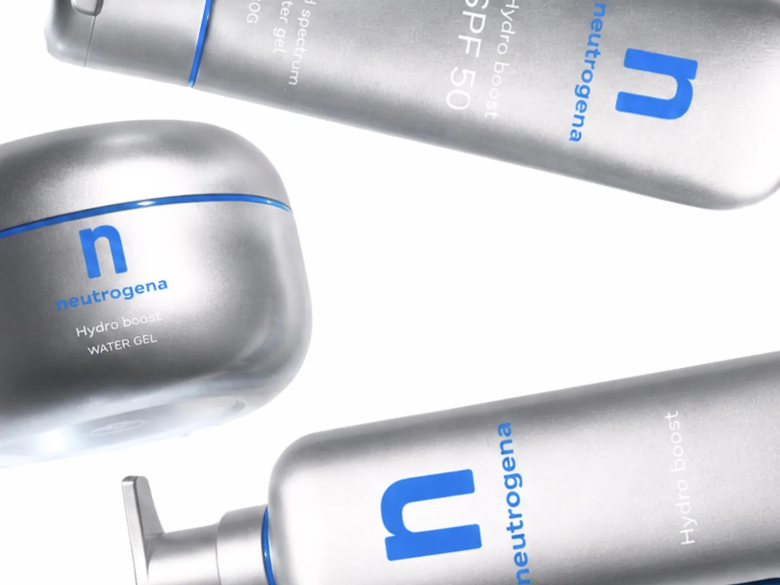 Three reimagined silver Neutrogena products floating, straight-on shot laid horizontal